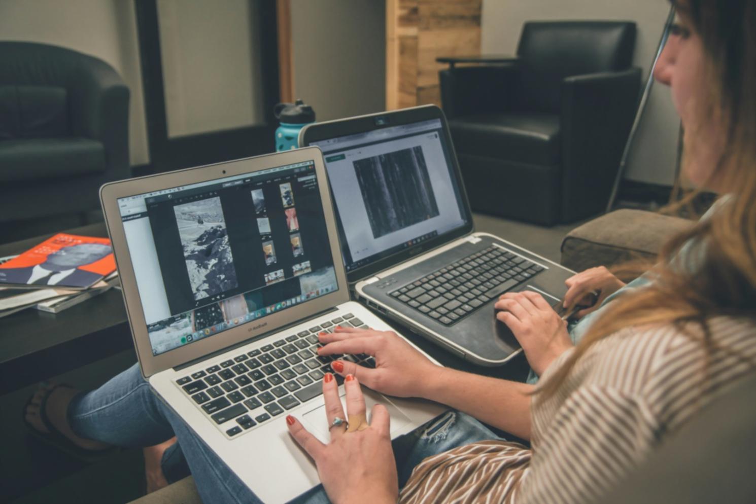 Professional workspace with financial documents and laptop